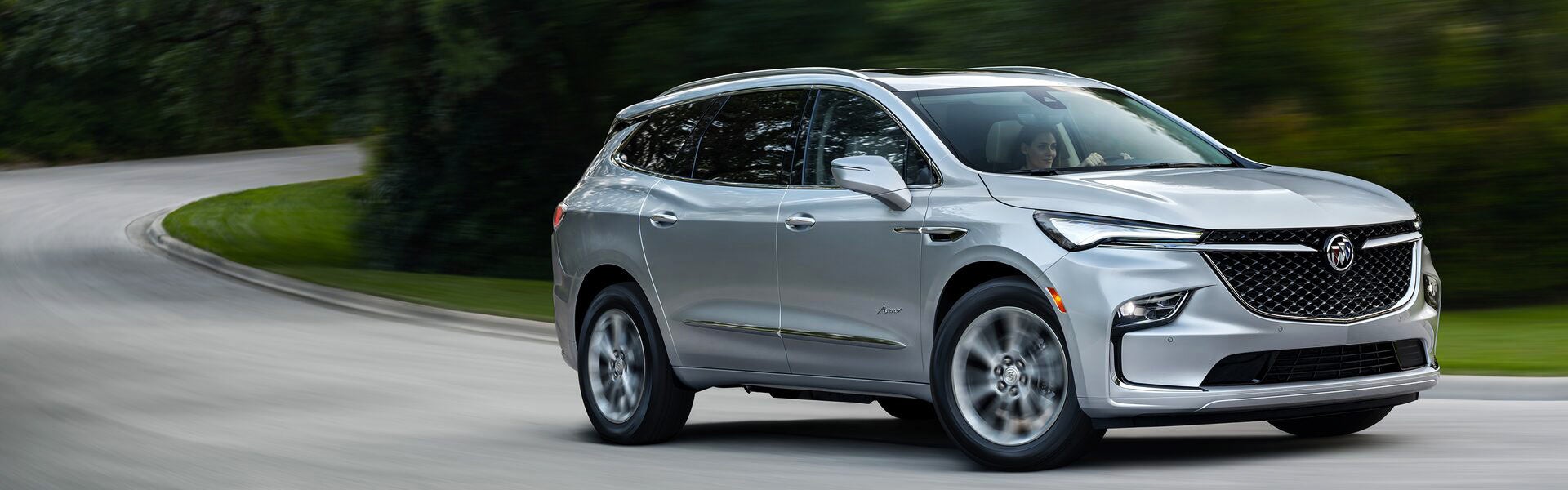 A silver Buick on a test drive
